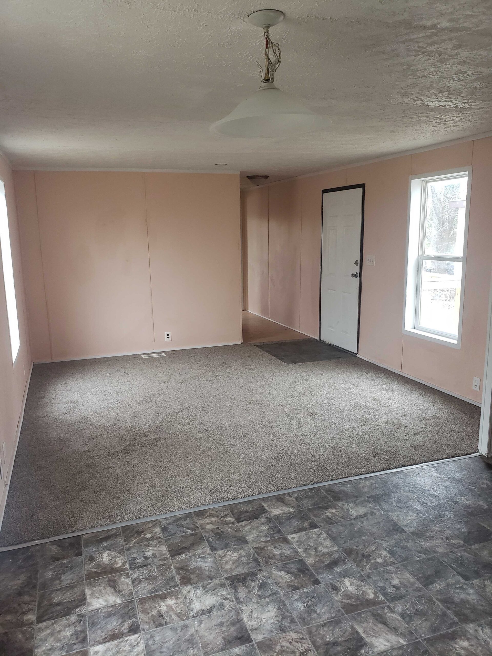 3-bedroom, 1-bathroom home for sale or rent-to-own in North Acres Mobile Home Park with bright and spacious interior and open space kitchen.