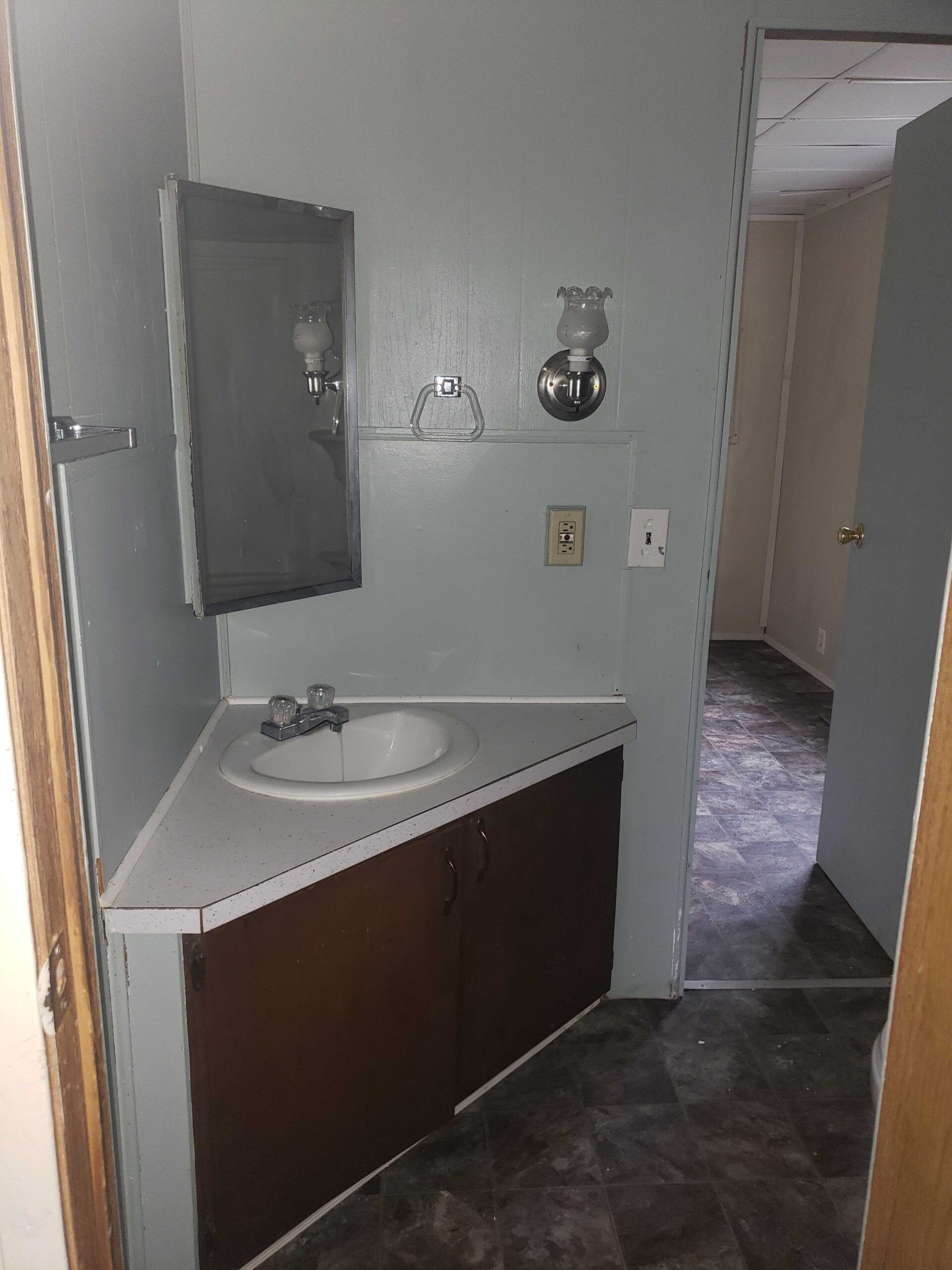 2-bedroom, 1-bathroom home for sale or rent-to-own in North Acres Mobile Home Park with a primary suite, walk-in closet, and modern accents.