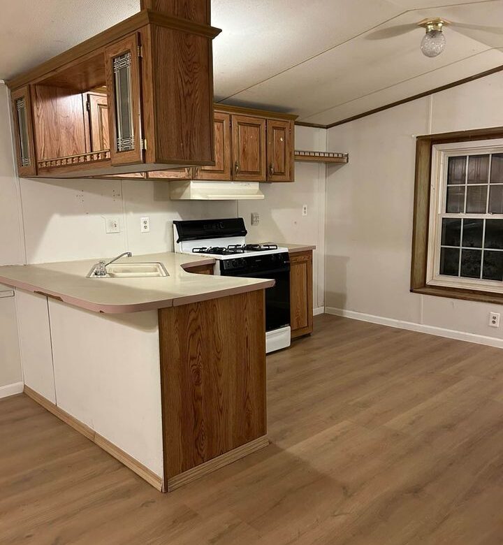 Newly renovated 3-bedroom, 1-bathroom home in Country View Mobile Home Park with modern interior and bright living spaces