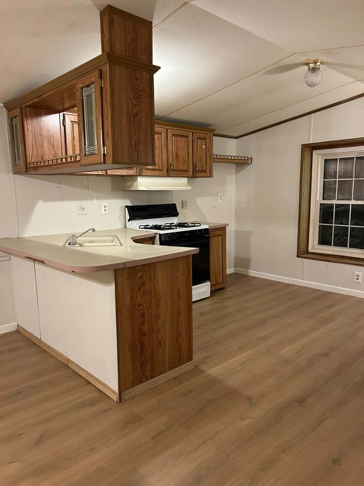 Newly renovated 3-bedroom, 1-bathroom home in Country View Mobile Home Park with modern interior and bright living spaces