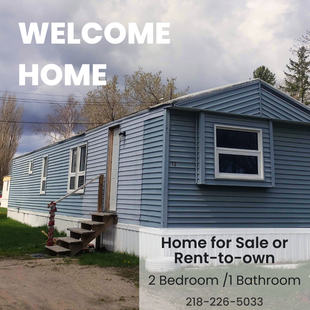 2-bedroom, 1-bathroom home for sale or rent-to-own in Carman Terrace Mobile Home Park with bright living spaces and a woody-like interior.