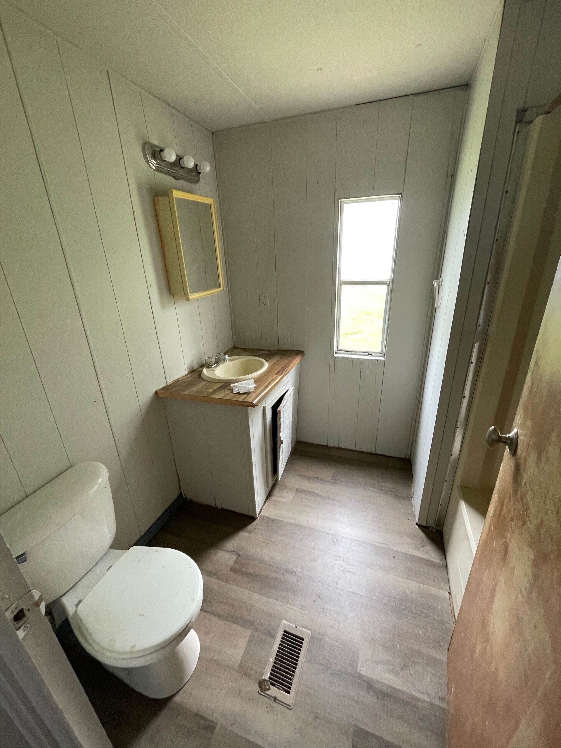 Newly renovated 2-bedroom, 1-bathroom home for sale in Columbia Mobile Home Park with bright living spaces and a well-equipped kitchen.