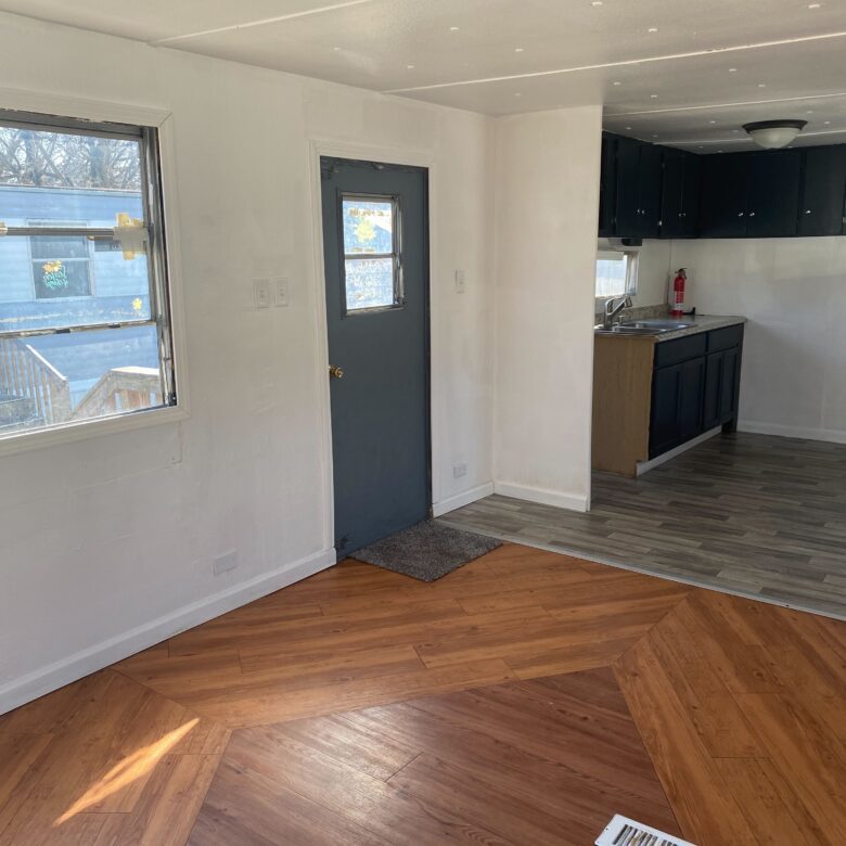 Newly renovated 2-bedroom, 1-bath mobile home for sale or rent in Hillsdale Mobile Home Park with modern touches and bright living spaces.