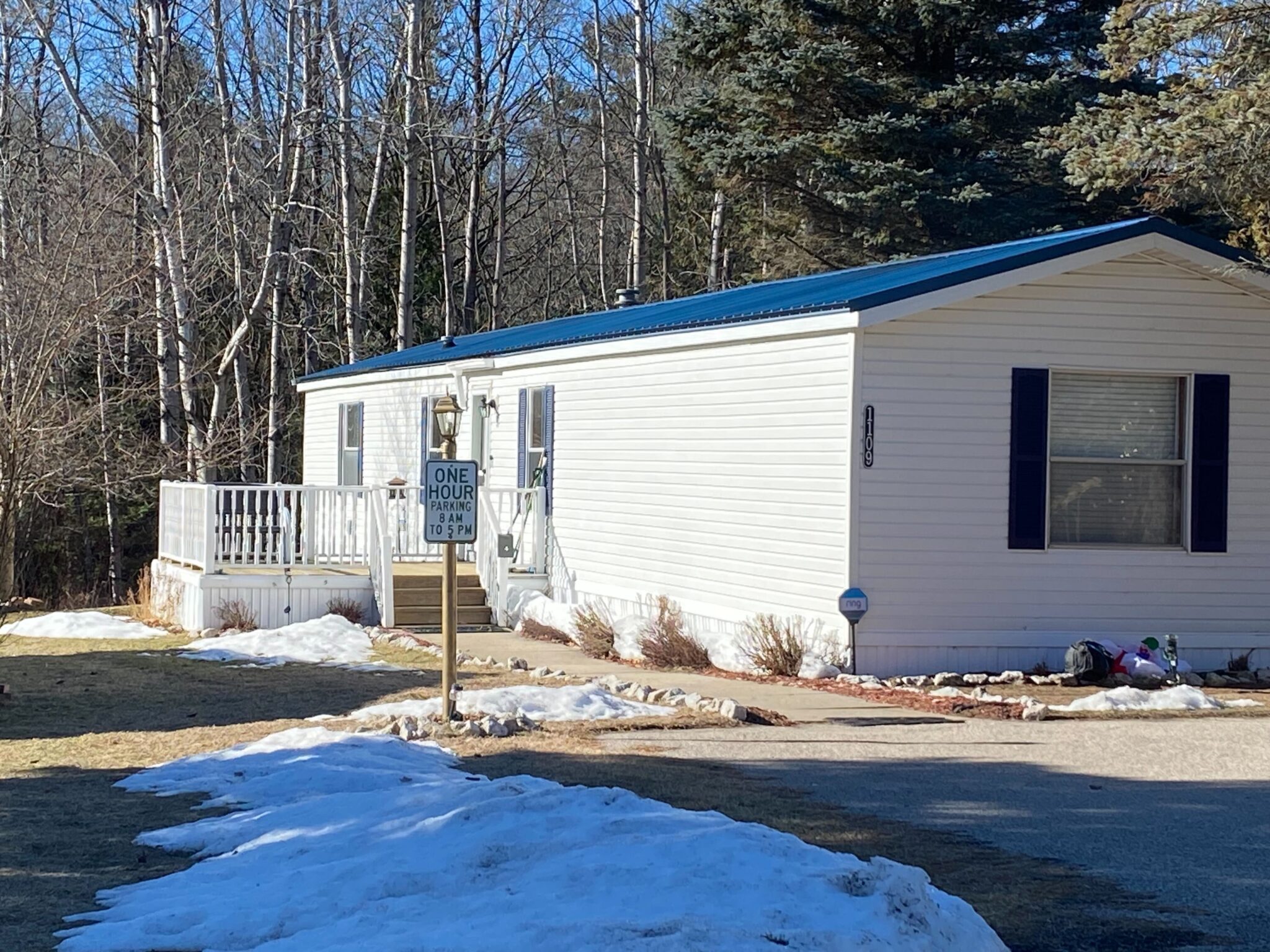 Ludington Mobile Home Park in Michigan with well-maintained mobile homes and lush surroundings