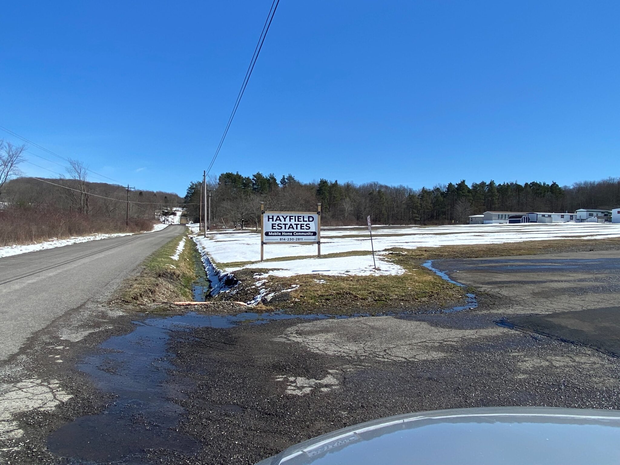 Hayfield Mobile Home Park in Saegertown, Pennsylvania with well-maintained mobile homes and scenic surroundings