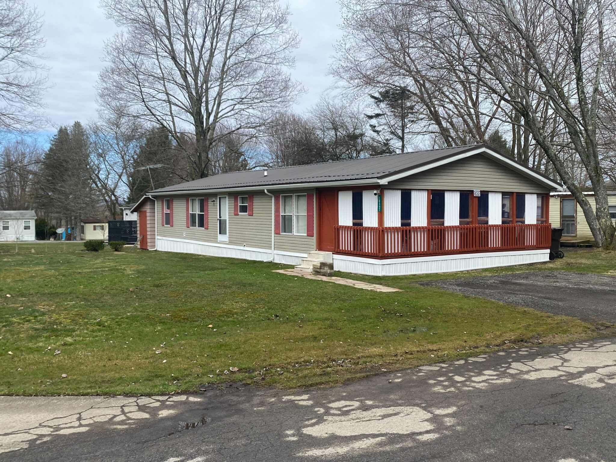 Hayfield Mobile Home Park in Saegertown, Pennsylvania with well-maintained mobile homes and scenic surroundings