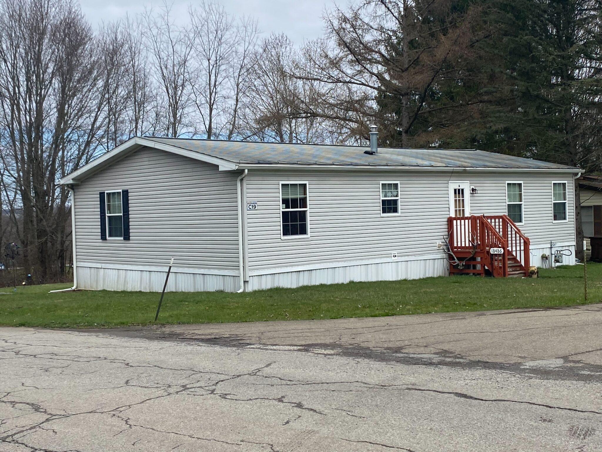 Hayfield Mobile Home Park in Saegertown, Pennsylvania with well-maintained mobile homes and scenic surroundings