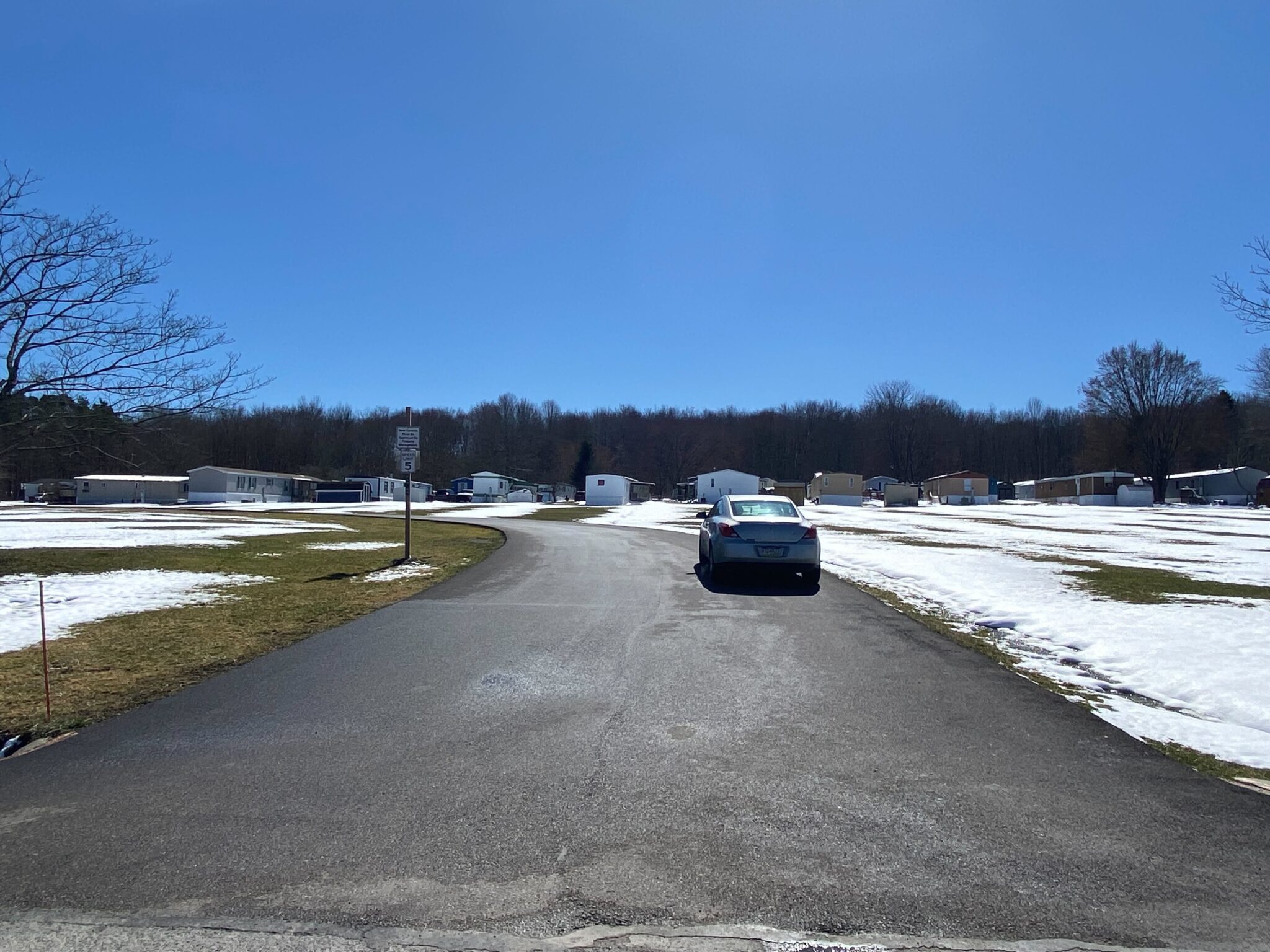 Hayfield Mobile Home Park in Saegertown, Pennsylvania with well-maintained mobile homes and scenic surroundings