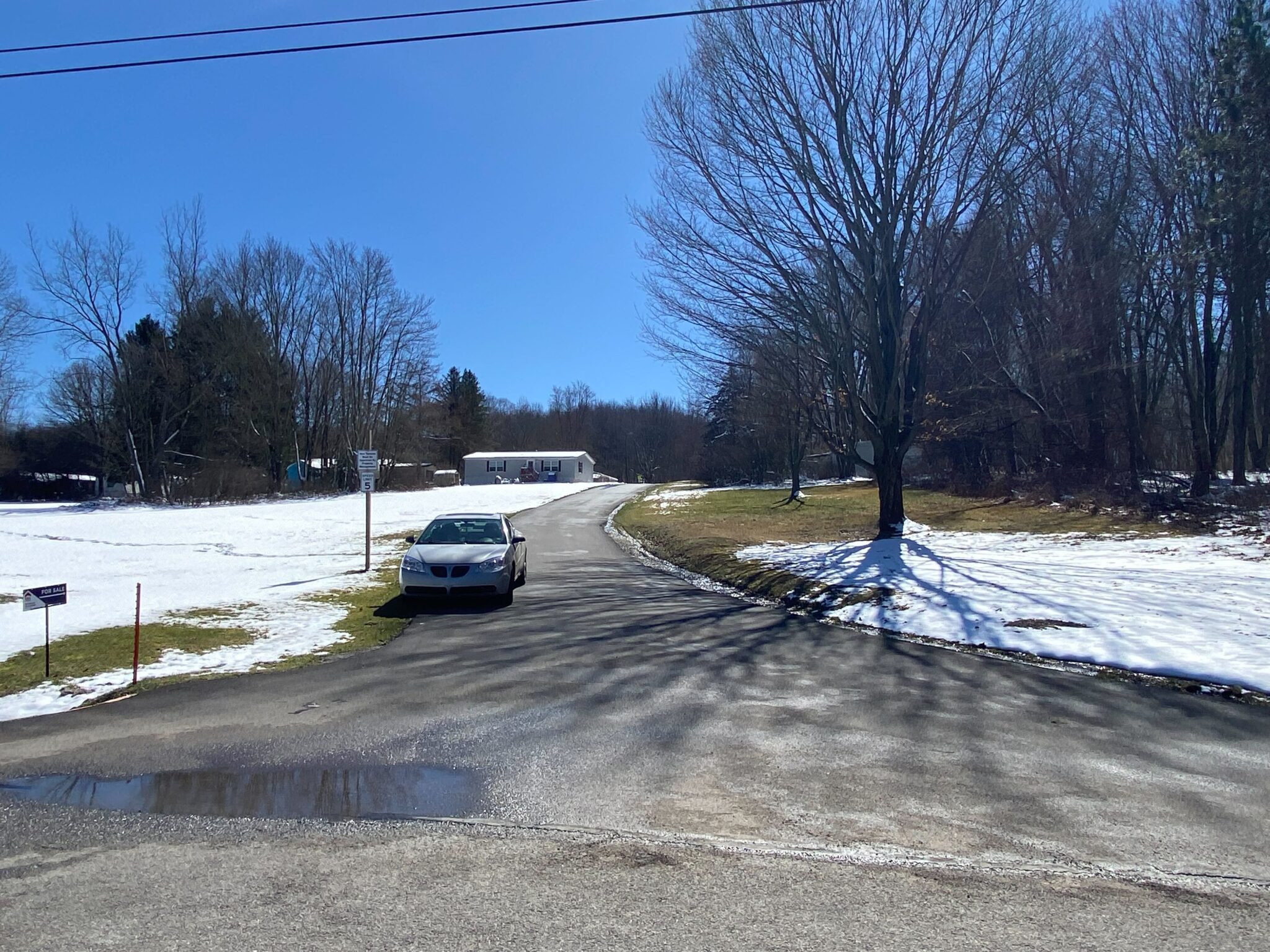 Hayfield Mobile Home Park in Saegertown, Pennsylvania with well-maintained mobile homes and scenic surroundings