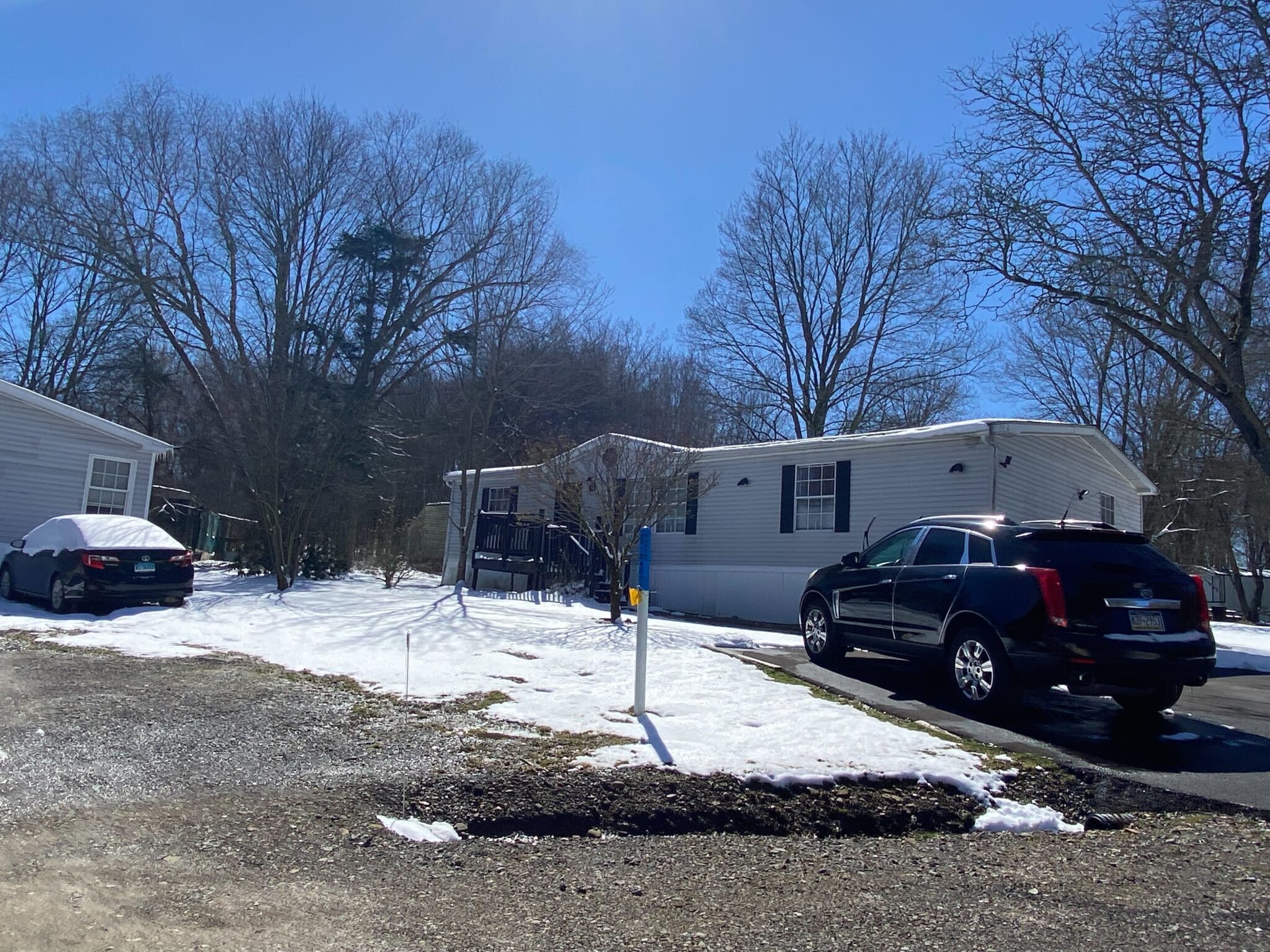 Hayfield Mobile Home Park in Saegertown, Pennsylvania with well-maintained mobile homes and scenic surroundings