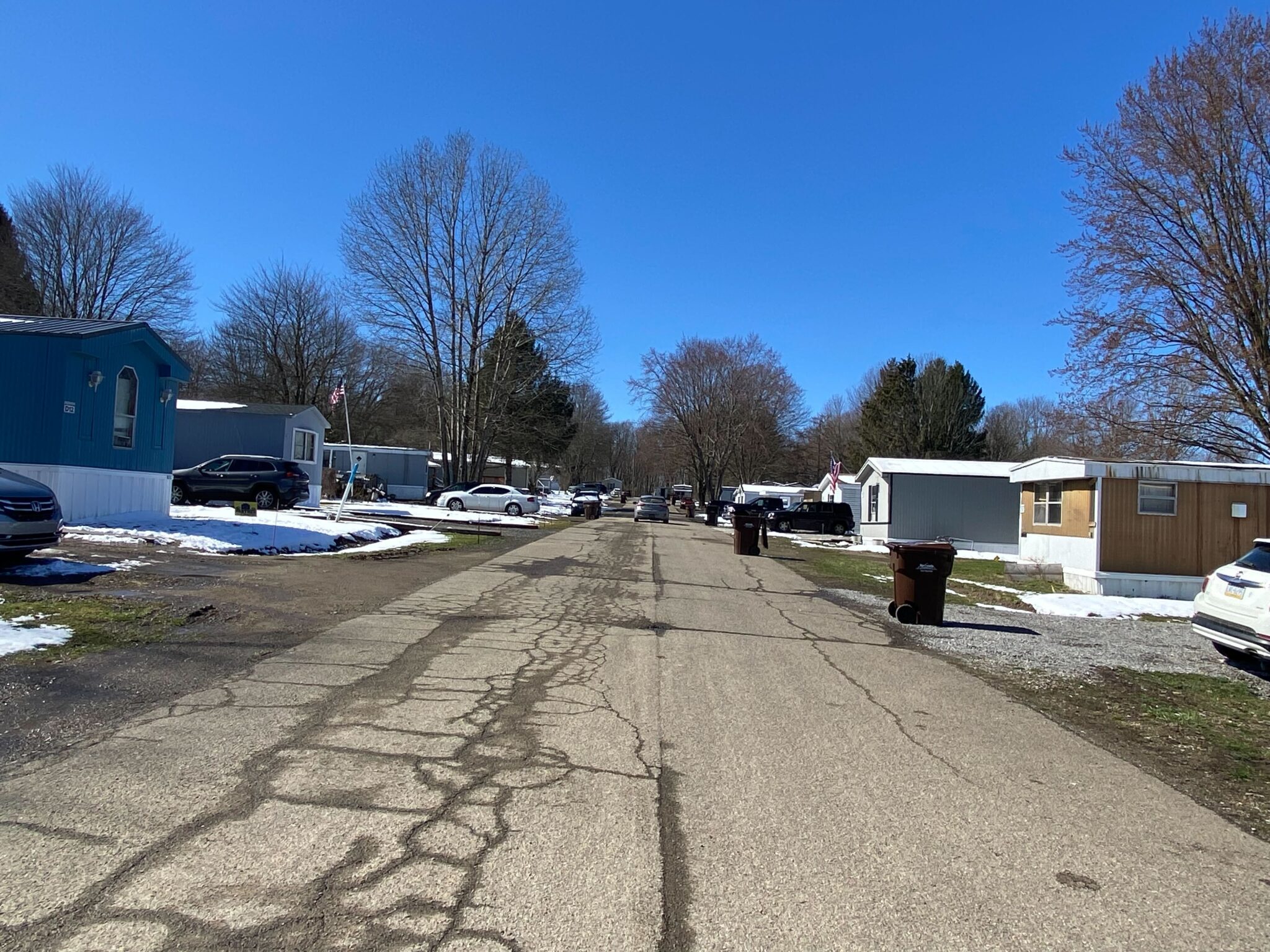 Hayfield Mobile Home Park in Saegertown, Pennsylvania with well-maintained mobile homes and scenic surroundings