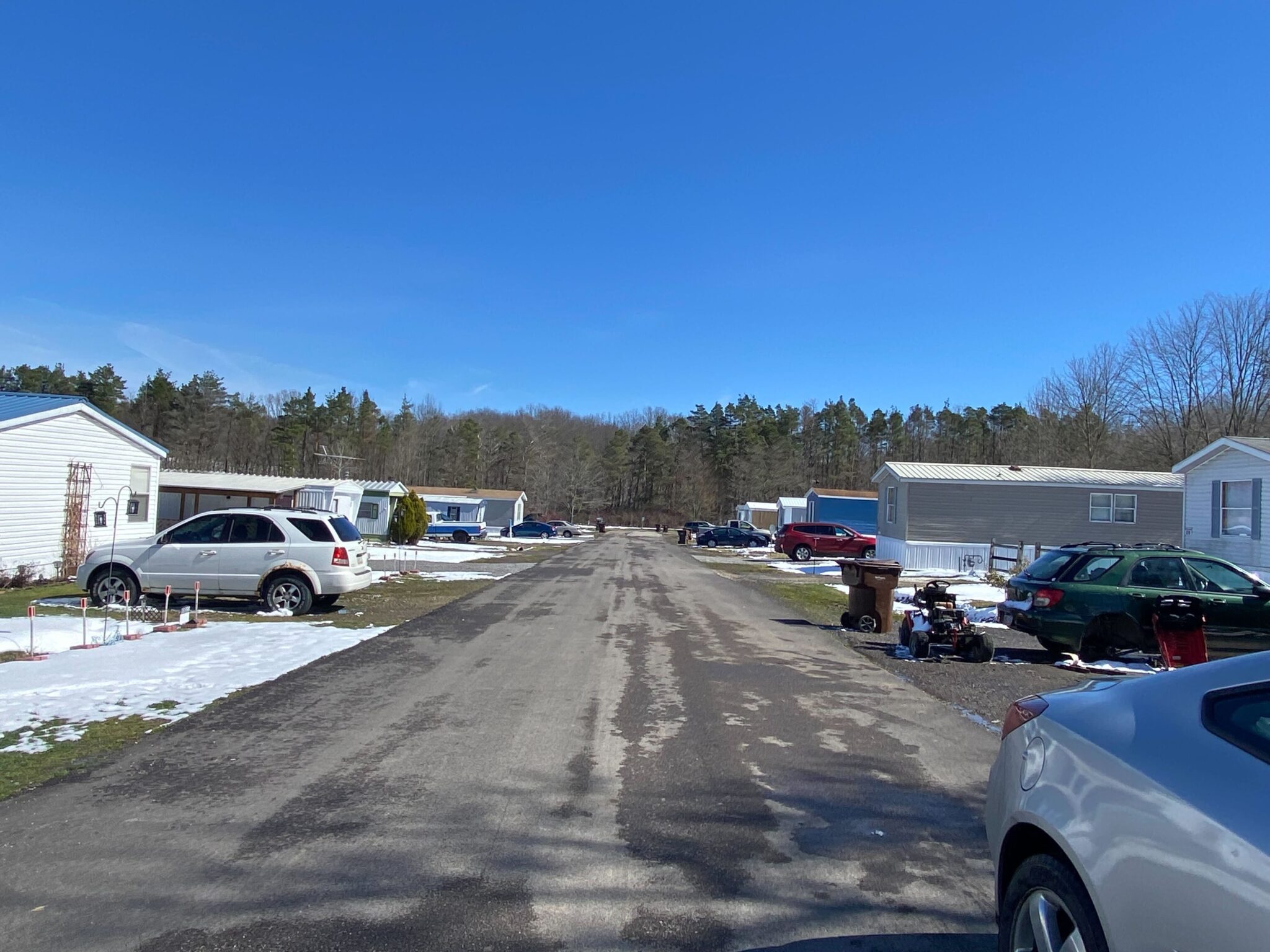 Hayfield Mobile Home Park in Saegertown, Pennsylvania with well-maintained mobile homes and scenic surroundings