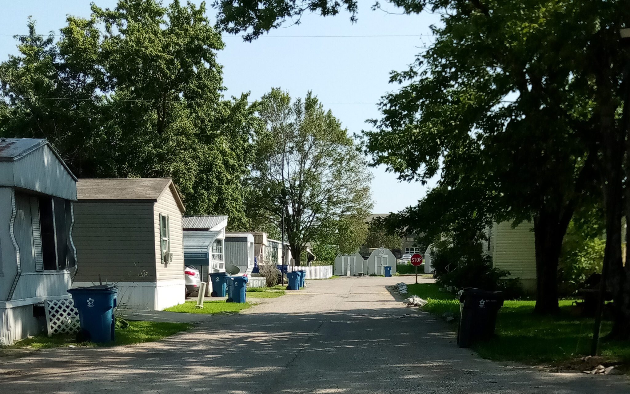 Picturesque street with mobile homes on either side