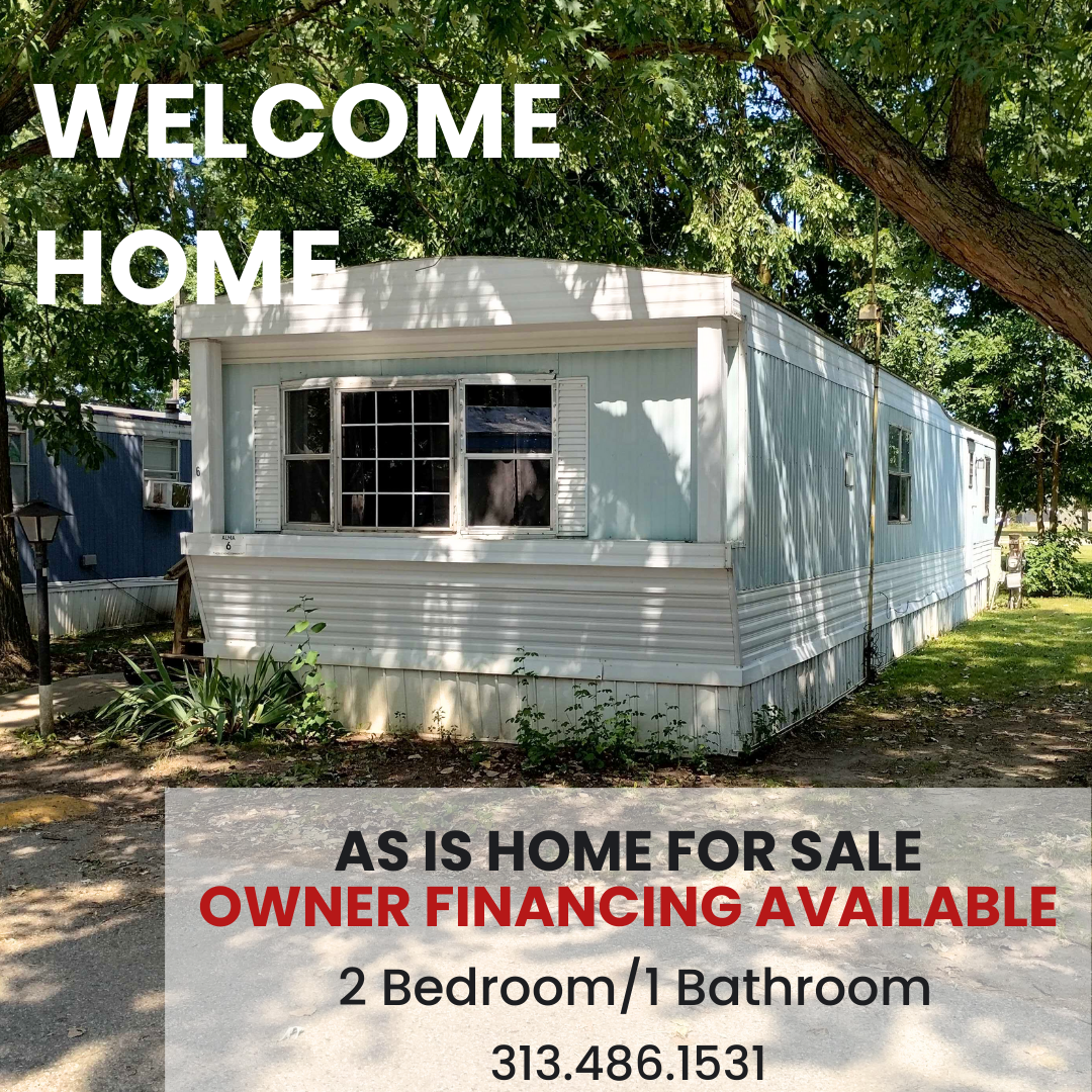 Exterior view of a spacious mobile home at Alma Mobile Home Community.